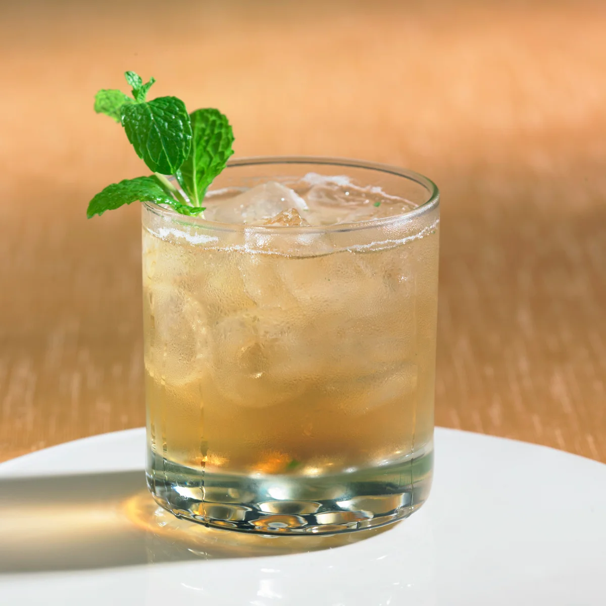 Ginger and vodka cocktail with mint leaves