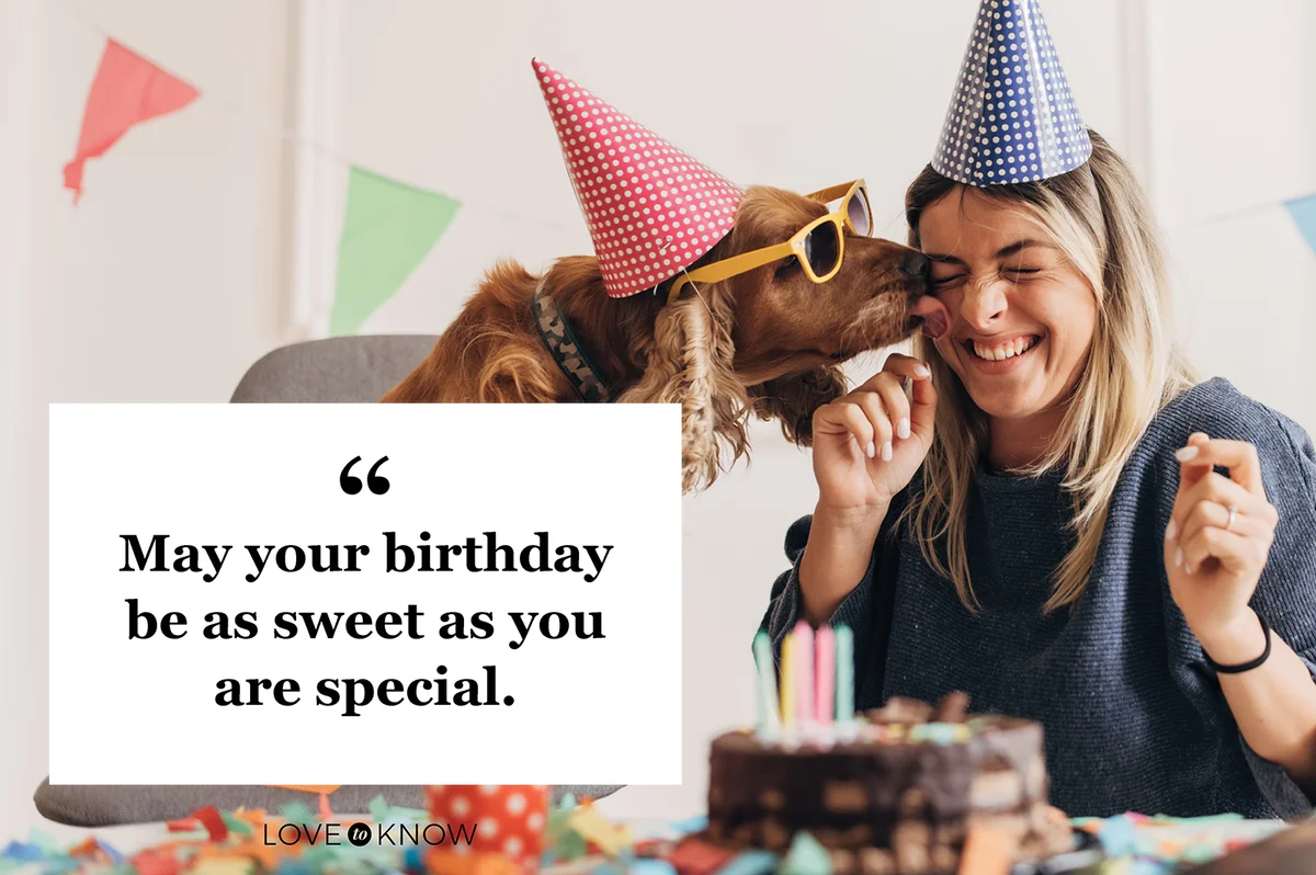 Beautiful woman celebrating her birthday with her dog