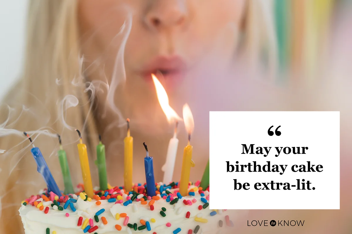 Woman blowing out birthday candles