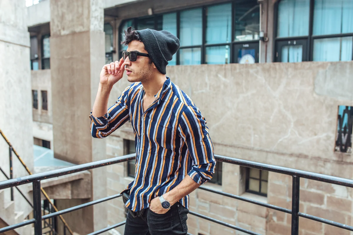 Stylish man wearing striped shirt