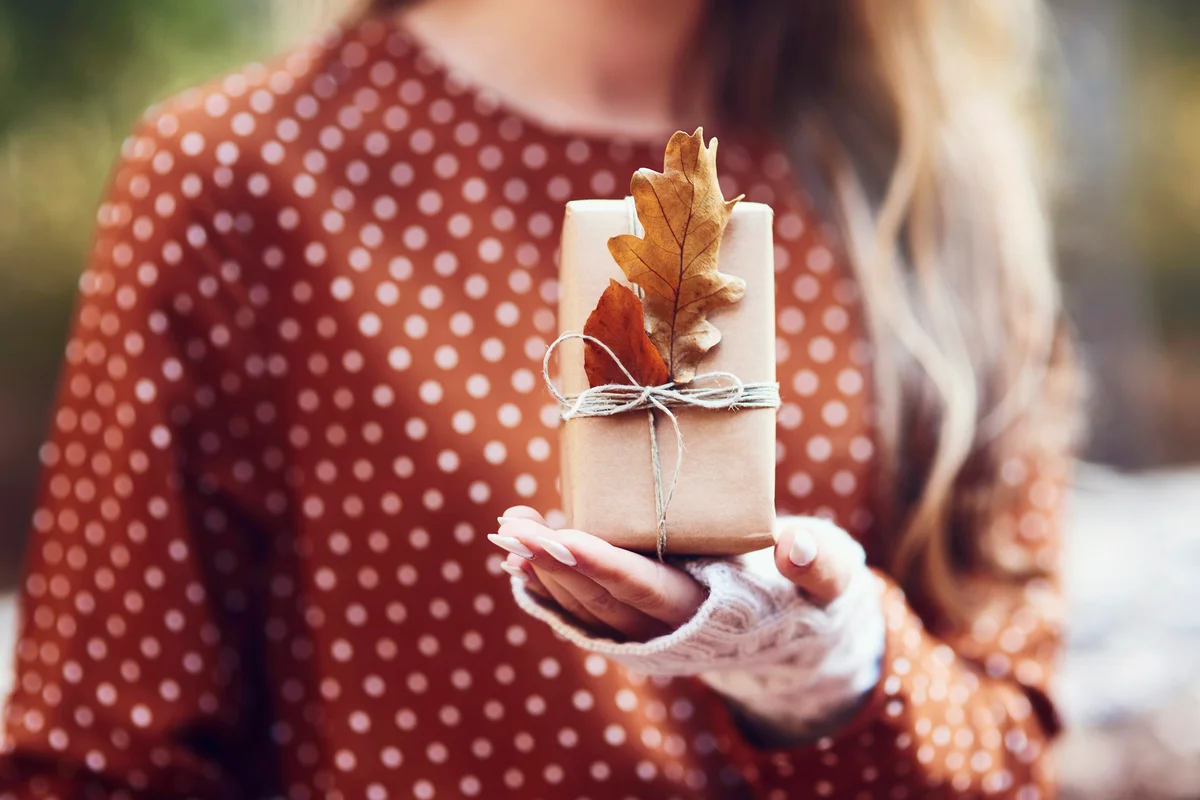 Woman Holding Thanksgiving Gift