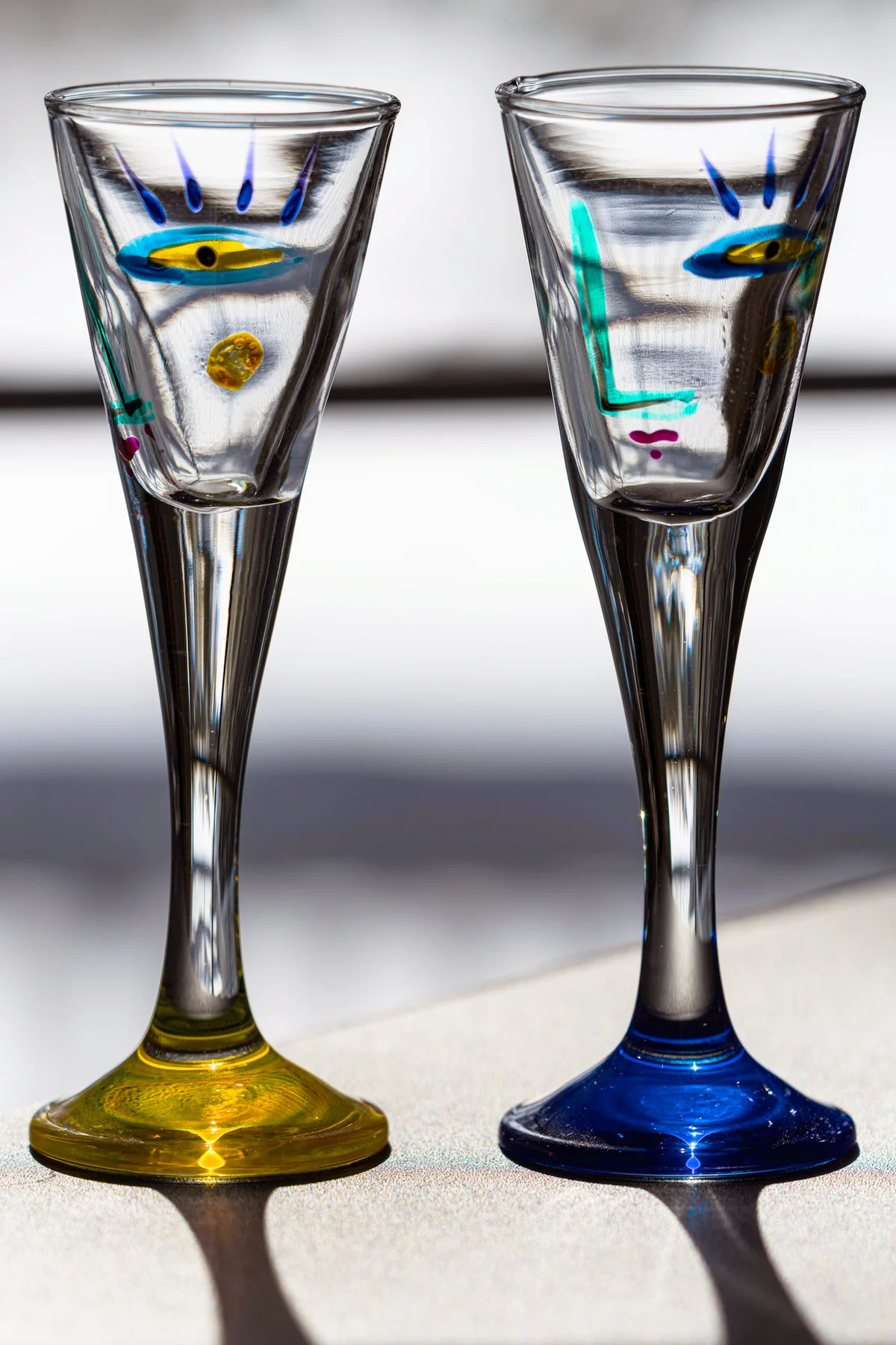 Painted glasses on table
