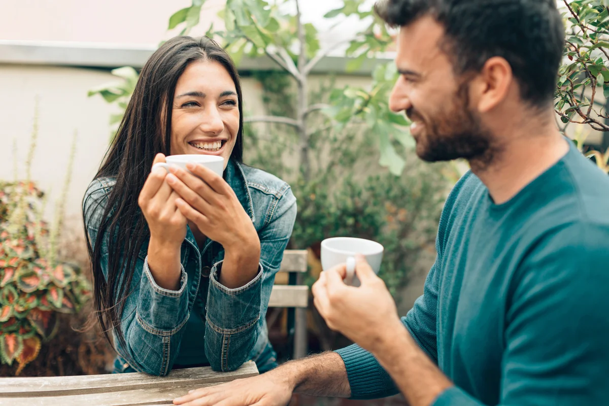 Couple drinking coffee and talking