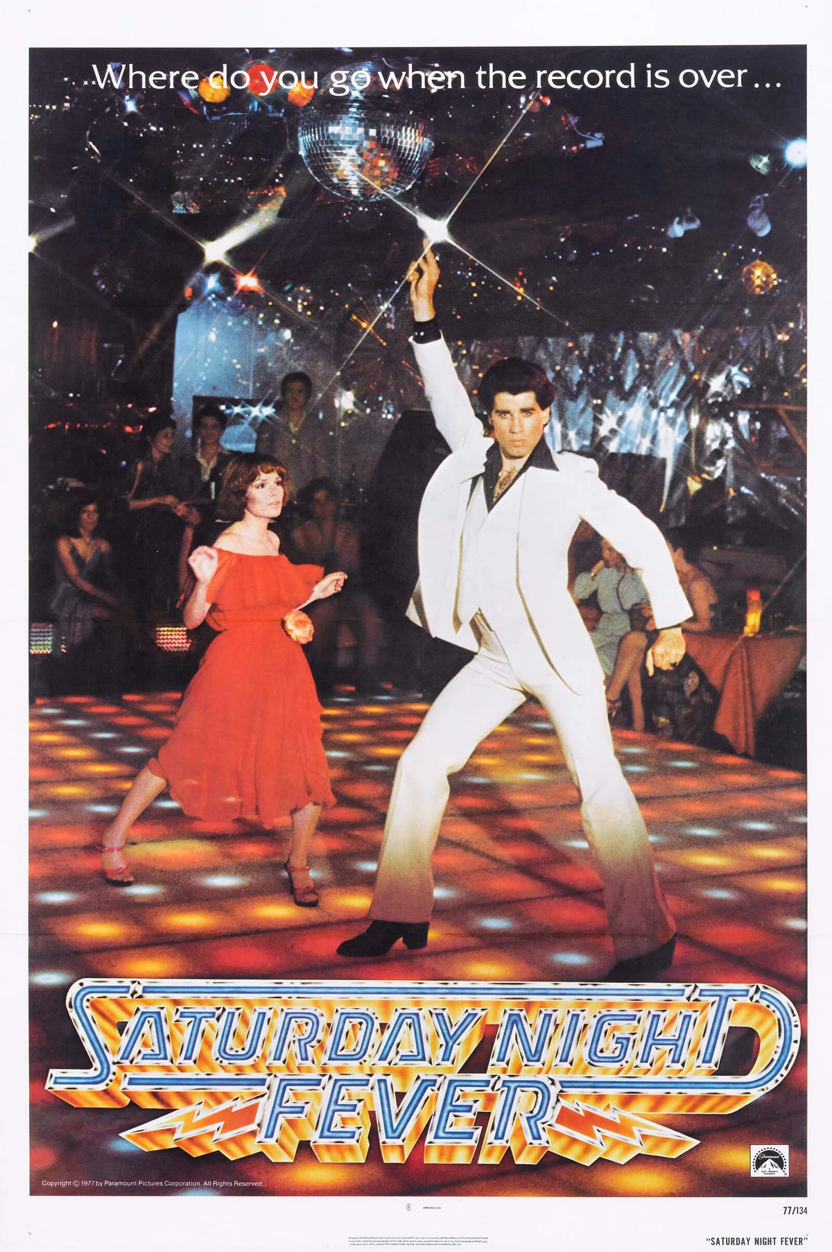 A poster for John Badham's 1977 drama 'Saturday Night Fever' starring John Travolta and Karen Lynn Gorney