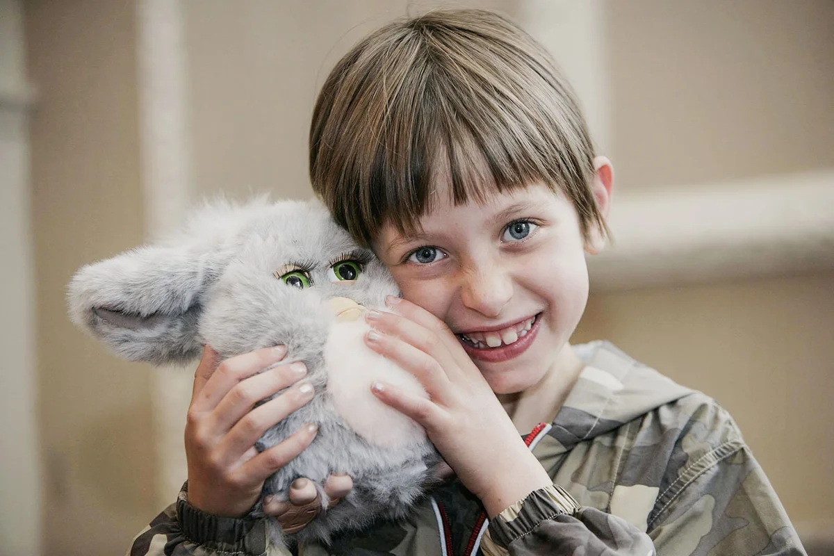 Scarlet Katz Roberts, aged 6, is introduced to the new Furby