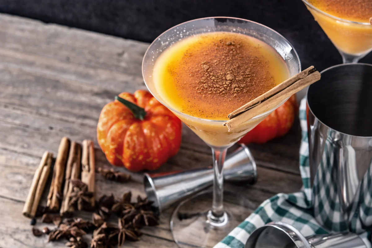 Pumpkin cocktail on wooden table