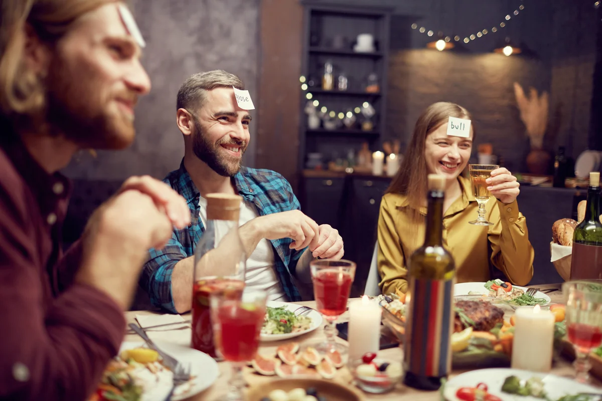 People Playing Guessing Game at Thanksgiving Dinner