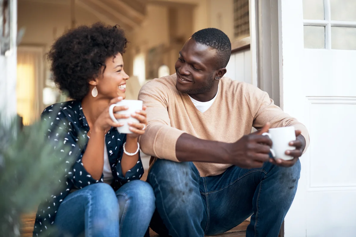 Happy young couple spending time together outside