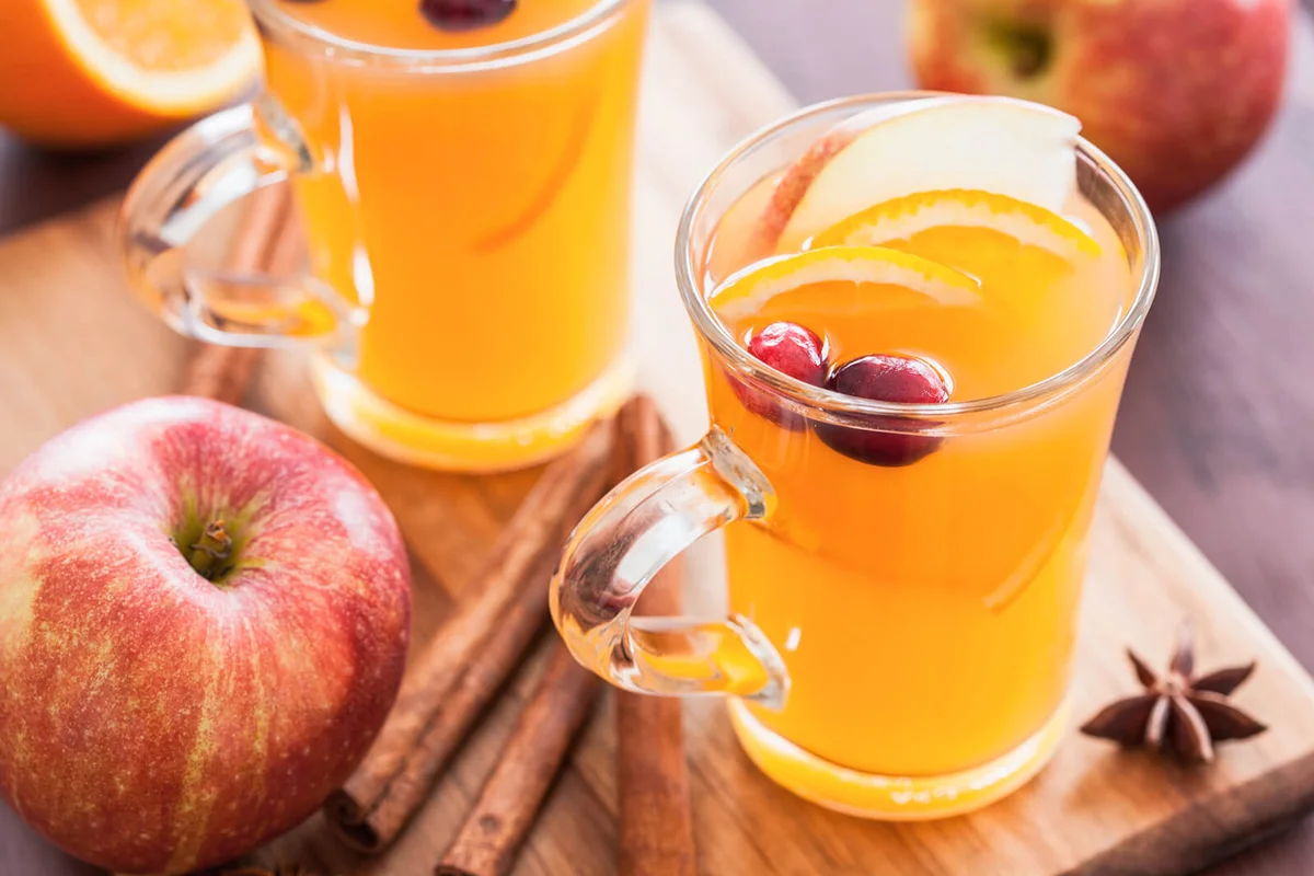 Hot apple orange cider with cinnamon spice warming drink