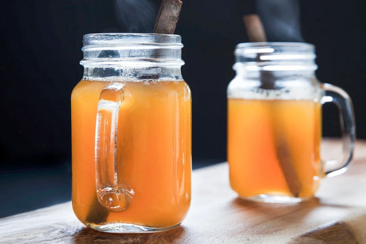 Mulled cider with a cinnamon stick
