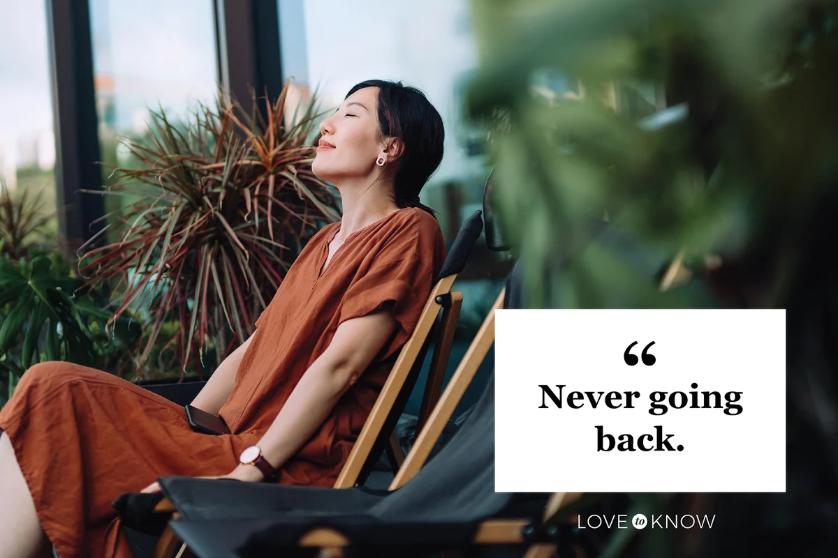 Woman with eyes closed enjoying fresh air while relaxing on deck chair