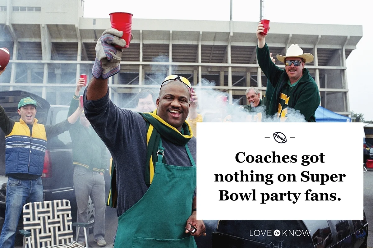 Men having barbecue at tailgate party in stadium parking lot
