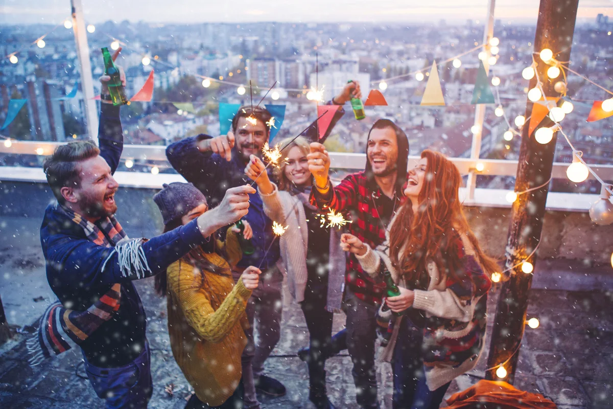 Group of friends at rooftop party
