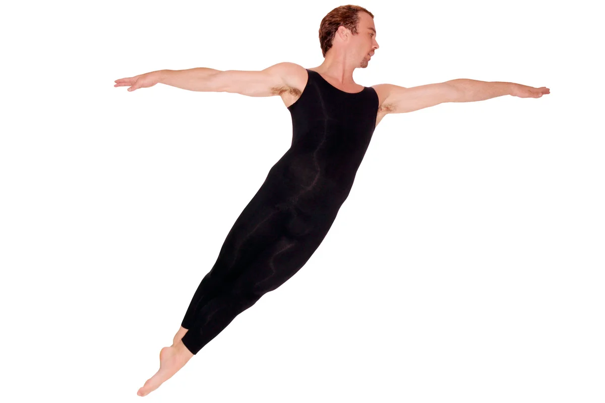Male ballet dancer in cabriolé movement
