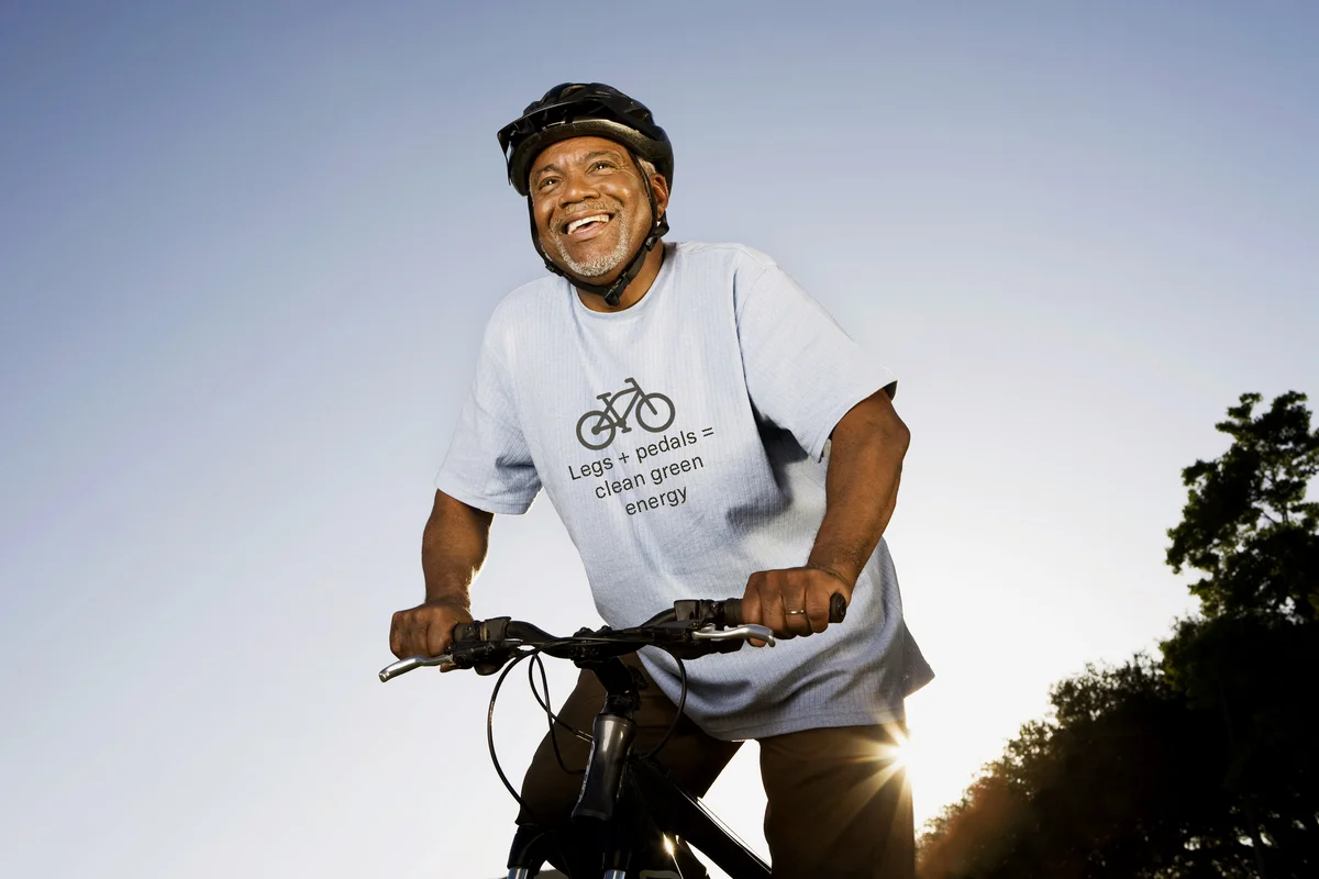 Smiling senior man with mountain bike