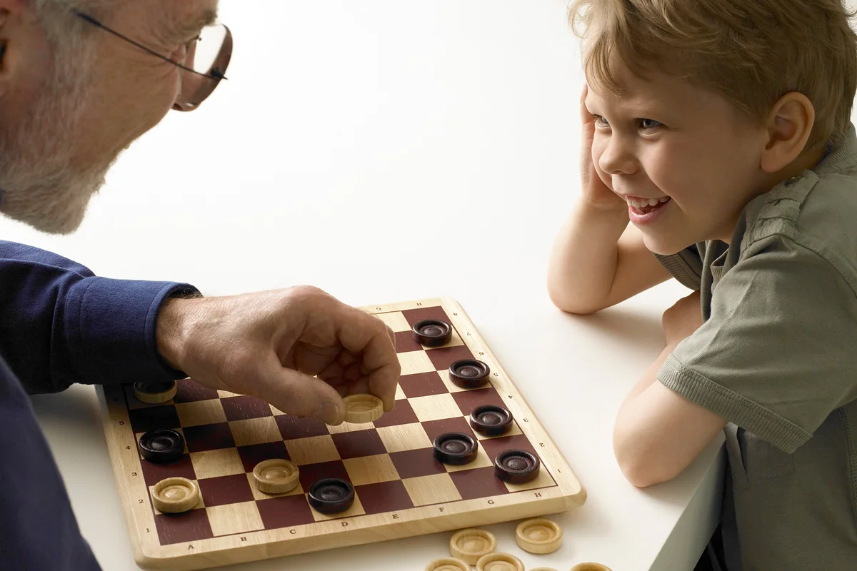 Playing checkers with grandfather