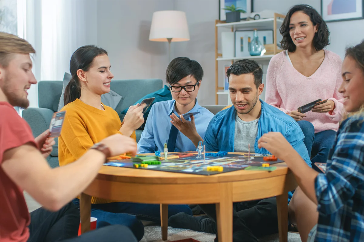 Friends Playing Mystify Board Game