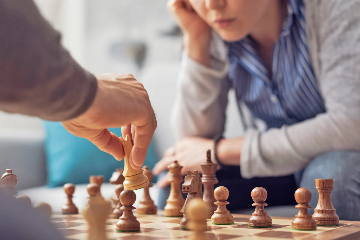 People playing chess together