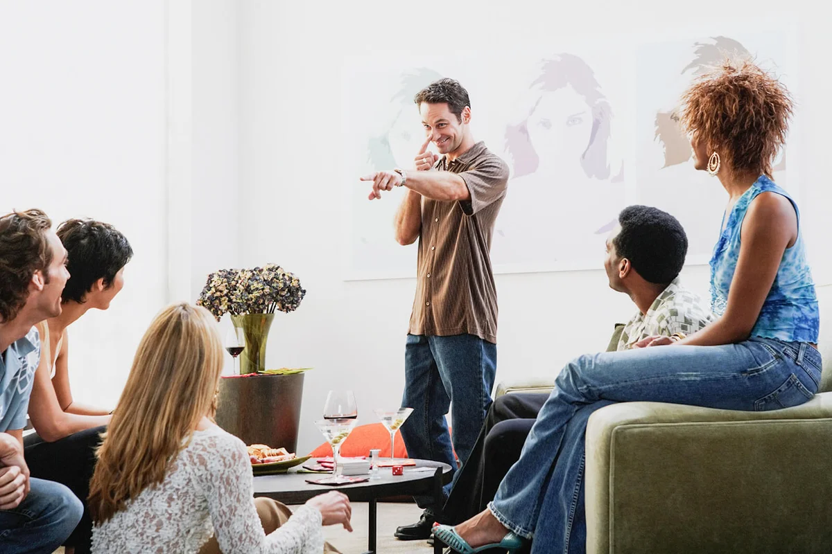 Friends playing charades