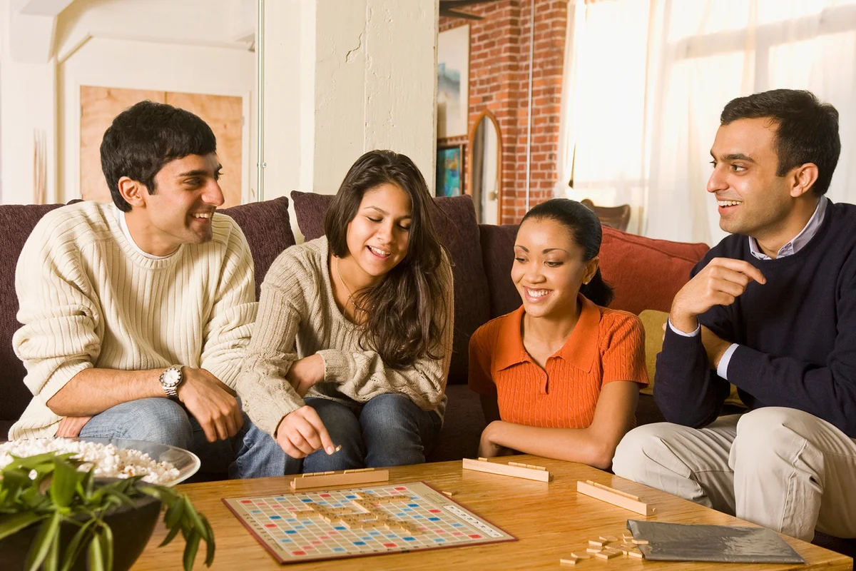family playing Party Games Joe Sequino winning moves