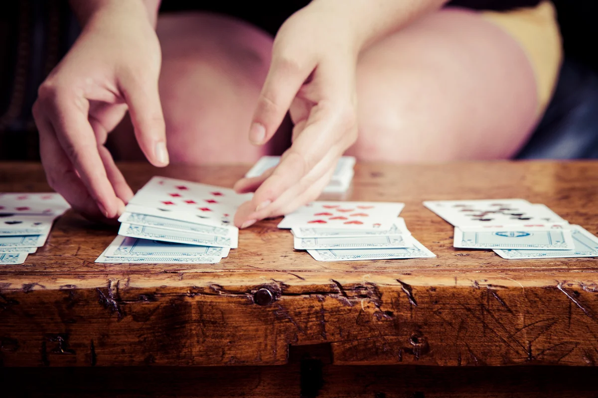 Woman Playing Solitaire