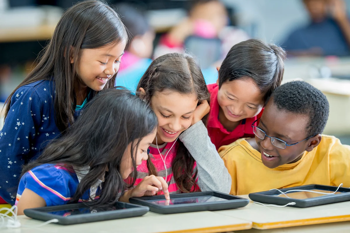 Children Playing Games on a Tablet