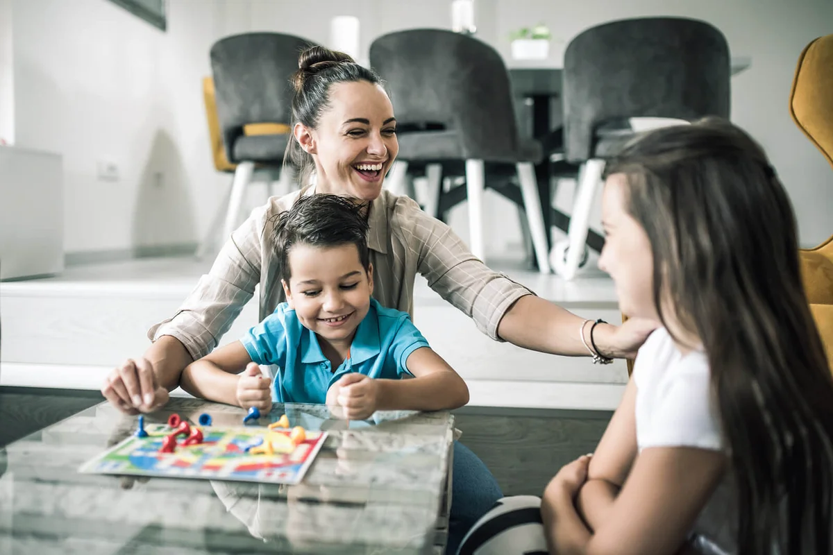 family playing board games toguether