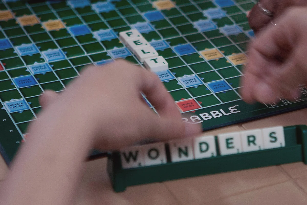 Person playing Scrabble - Getty Editorial Use