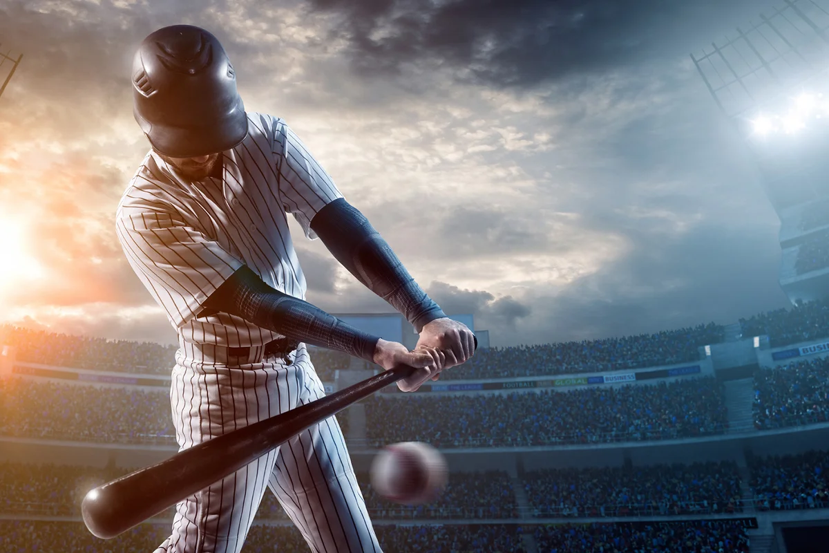 Baseball player about to strike ball