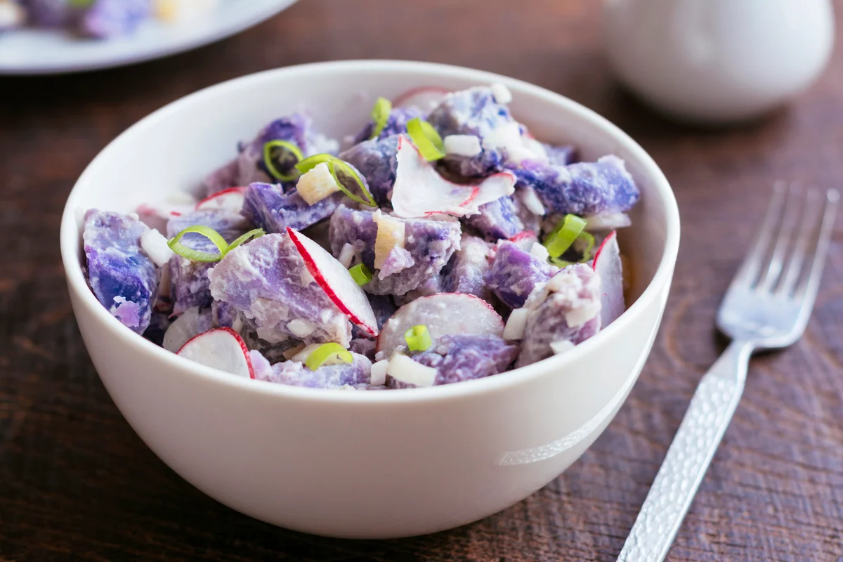 Purple potato salad with radishes
