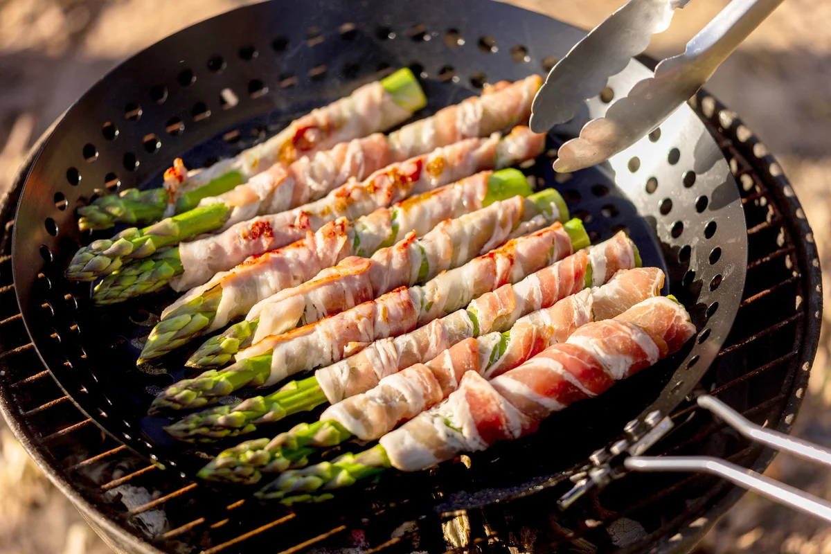 Asparagus Wrapped in Bacon on a Barbecue Grill