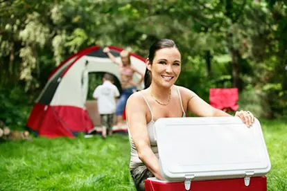 Woman opening cooler