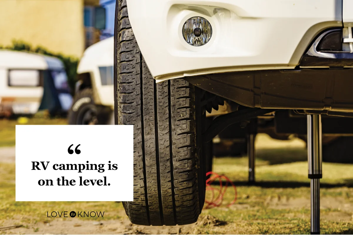 Camper leveling support leg in use
