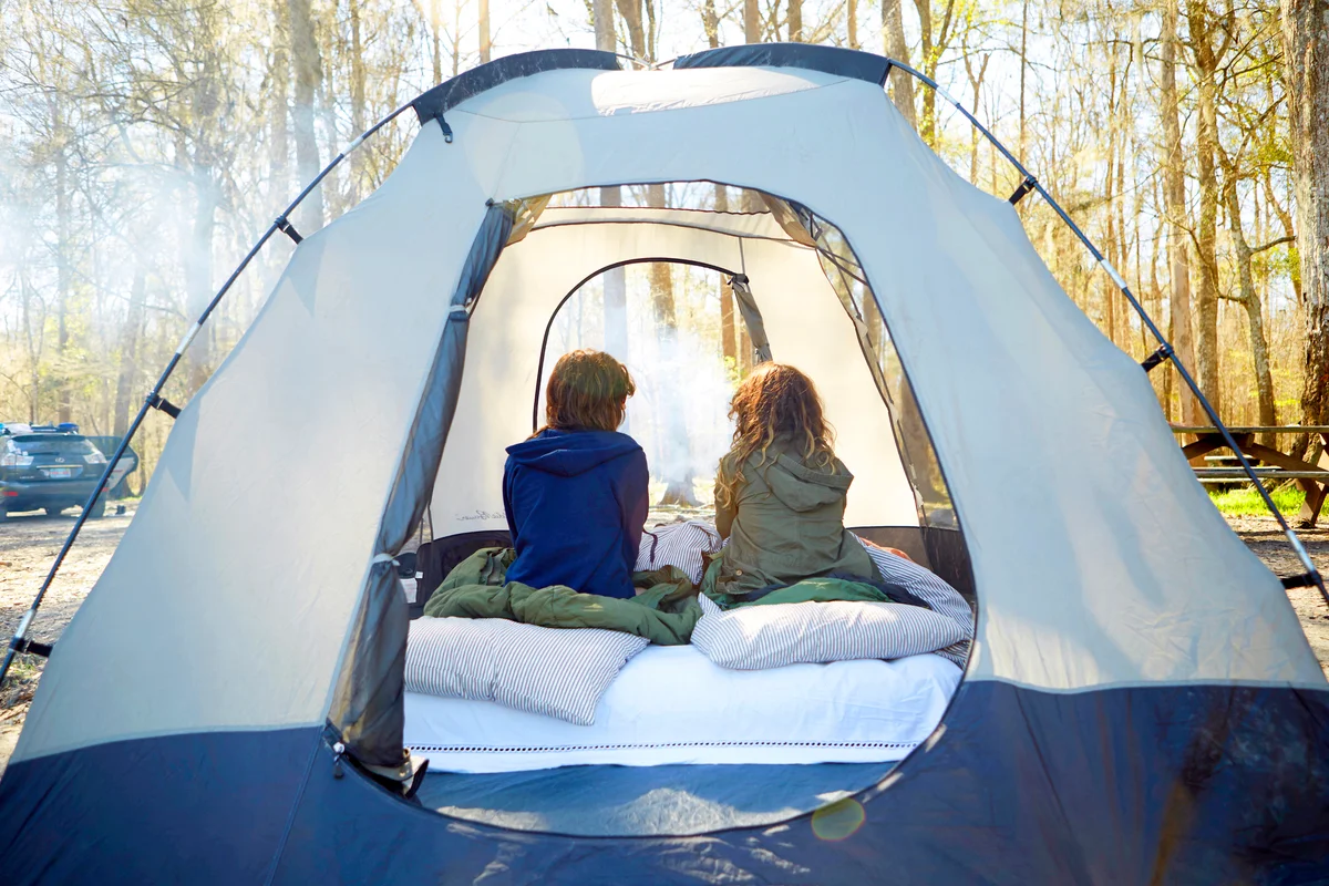Kids inside camping tent