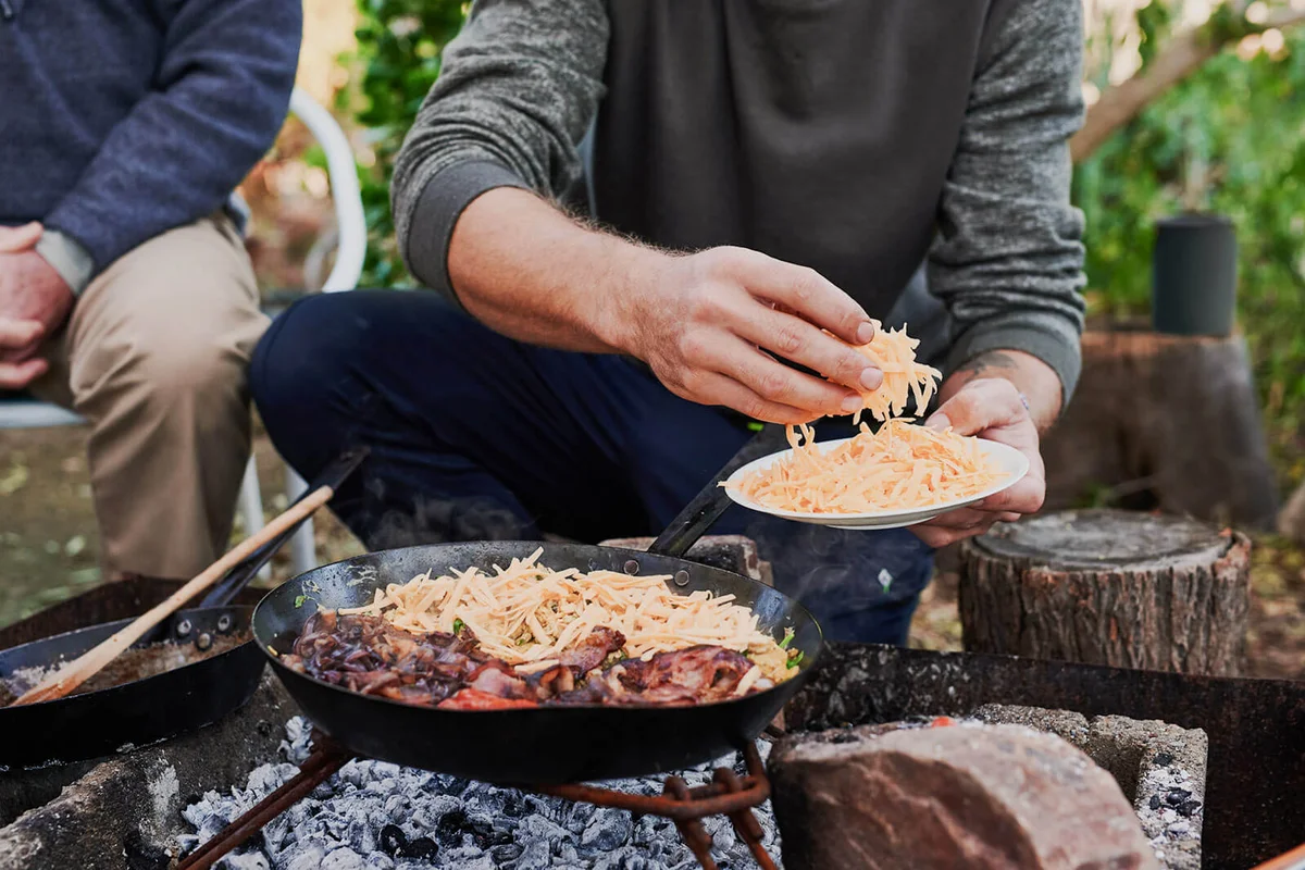 man and his father having a barbecue