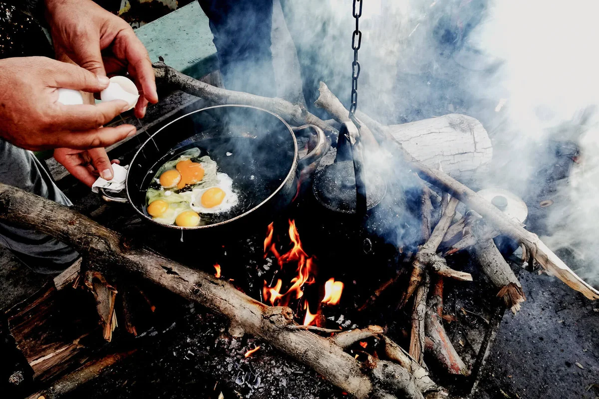 Cropped Hands Making Egg