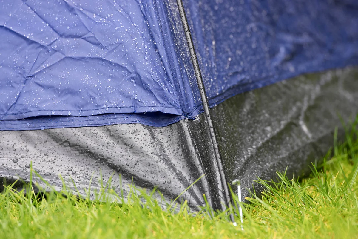 rain running down sides of a small tent