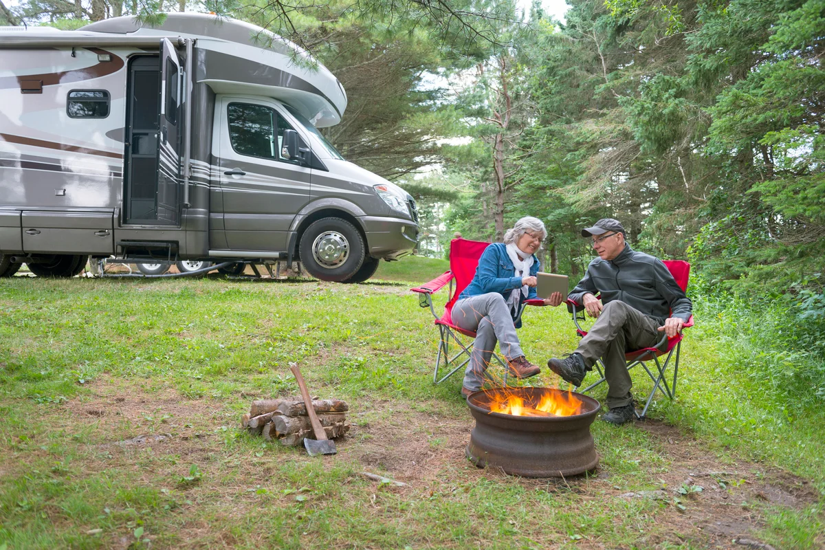 Couple camping with an Rv