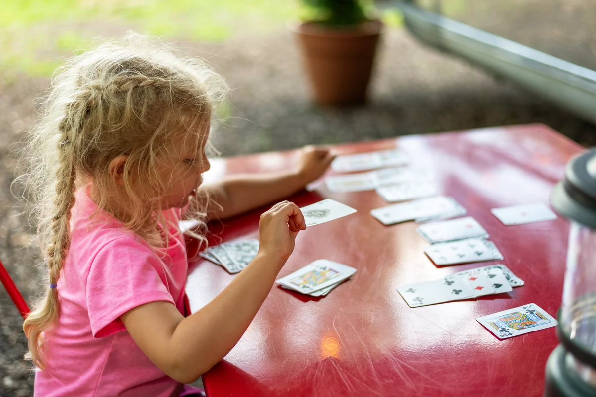 Girl playing solitaire