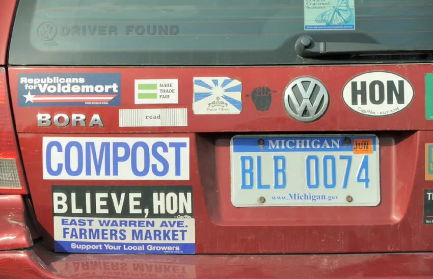 car with bumper stickers
