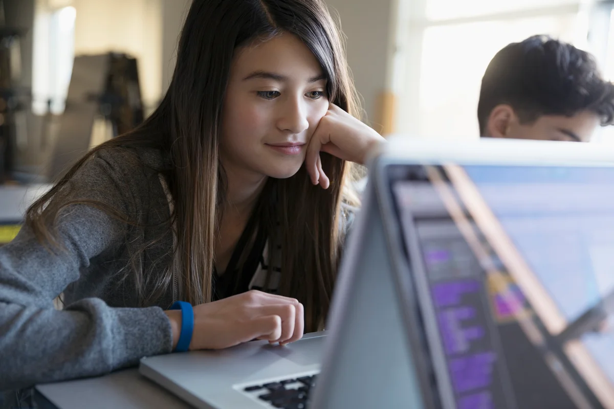 girl using laptop