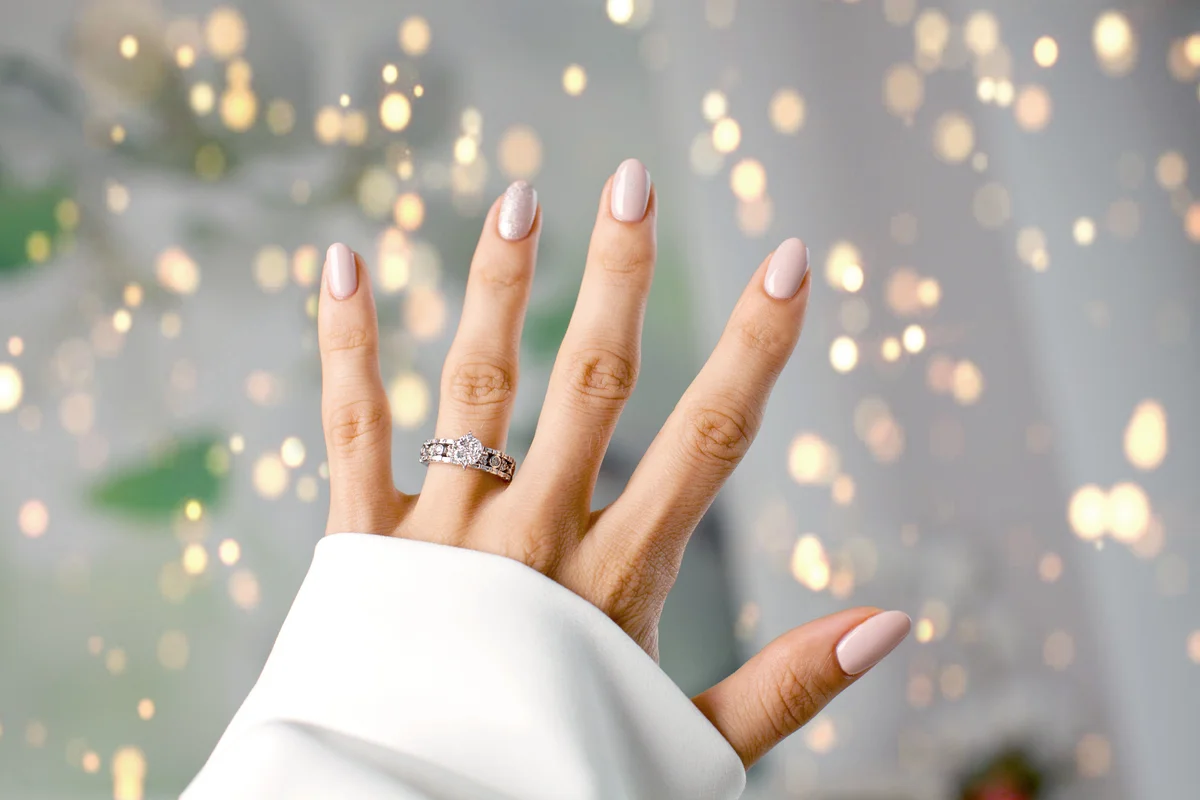 Diamond ring on a finger on New Year's Eve