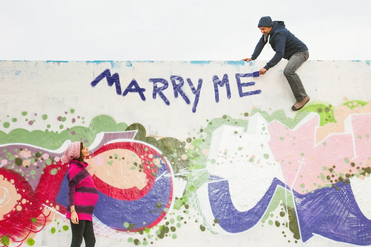 Man proposing to pregnant woman