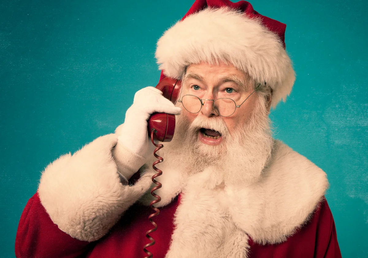 Santa Claus on red phone