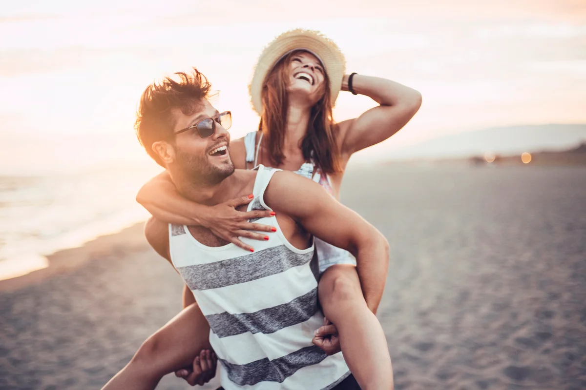 Piggy back ride at the beach