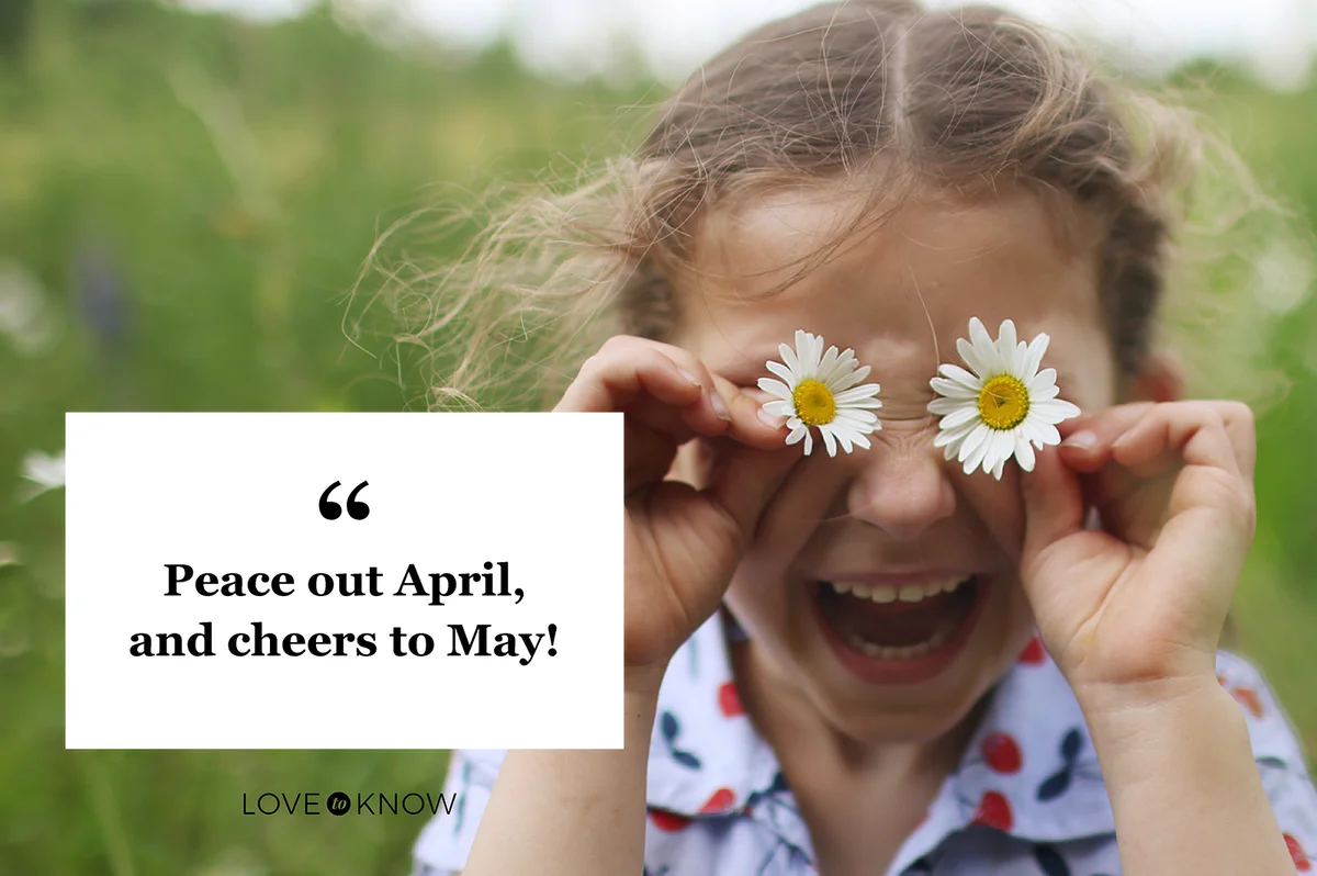 Girl playing with daisies in a field