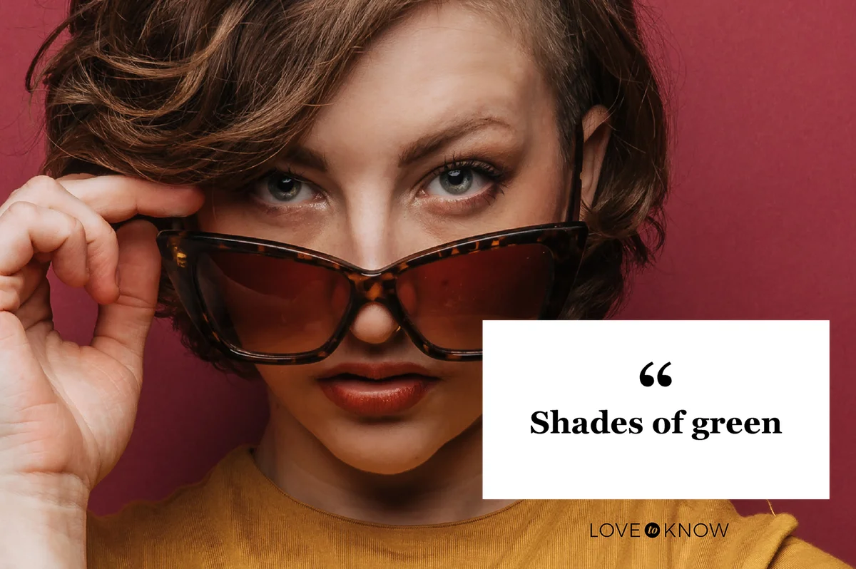 Young woman with green eyes wearing sunglasses