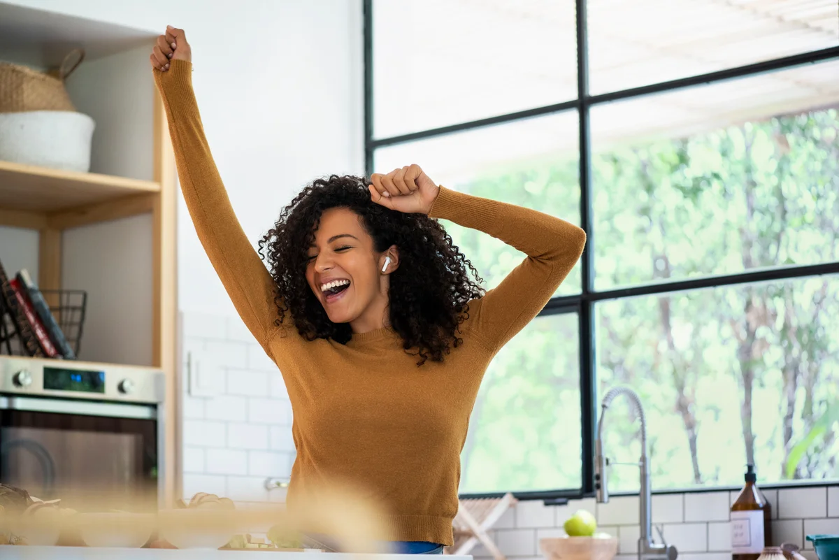 woman dancing in kitchen