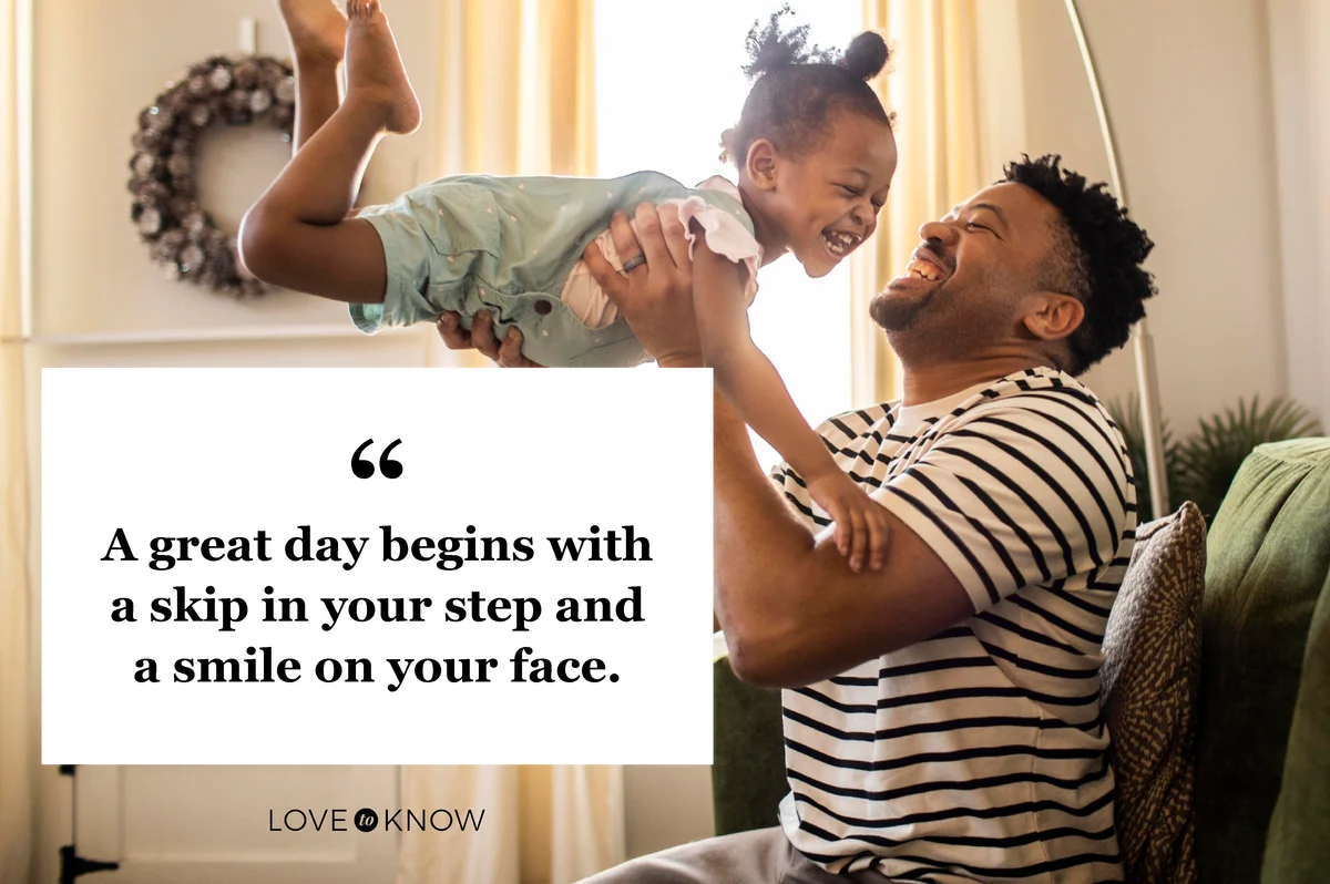 Father lifting toddler daughter in the air