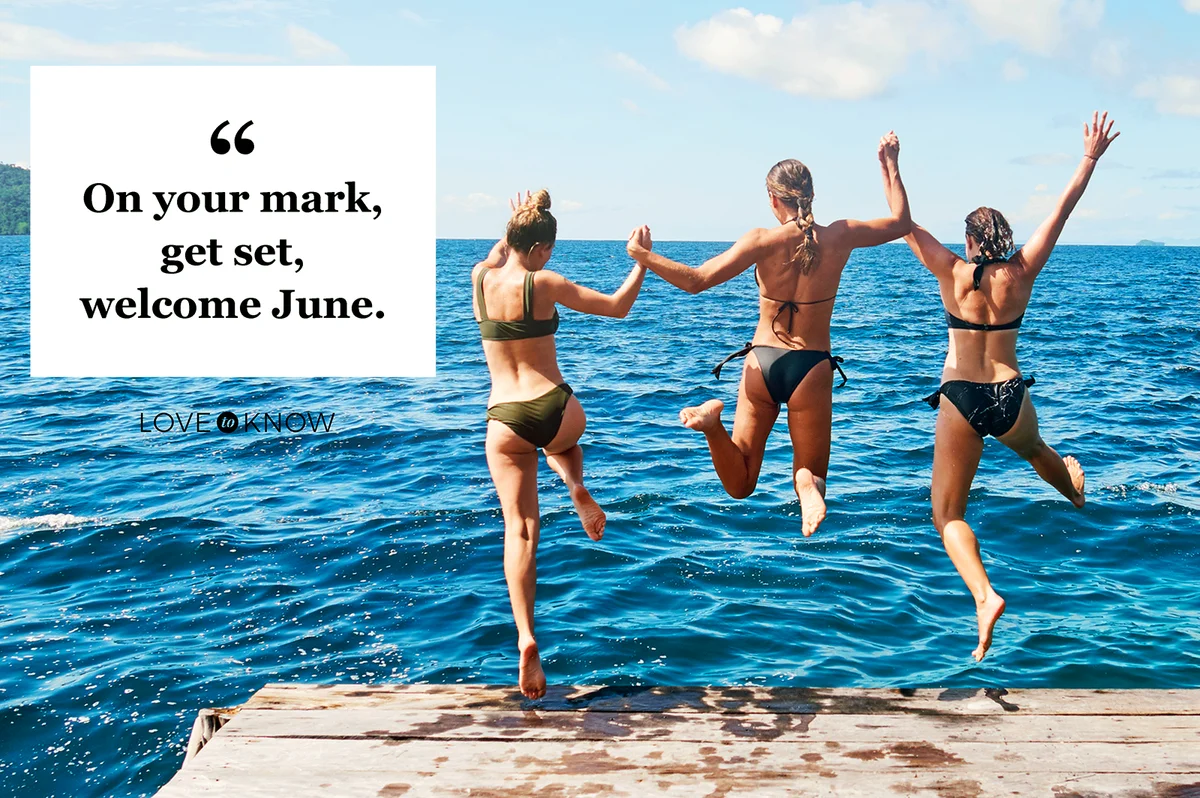 Group of young women jumping off a pier and into the ocean together
